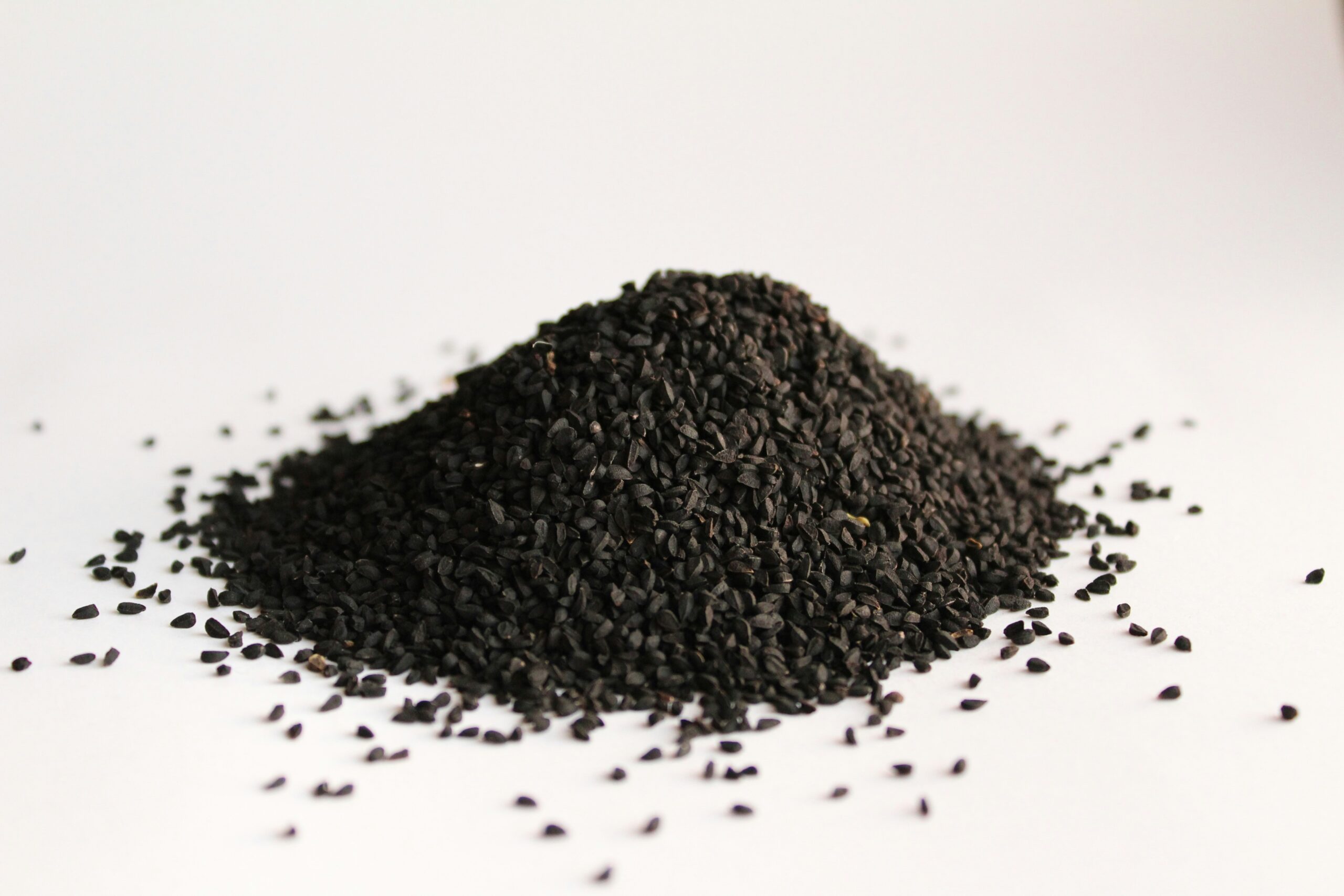 Black granular material representing processed recycled rubber